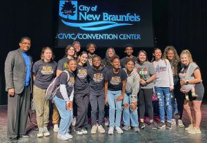 Group of students on stage.